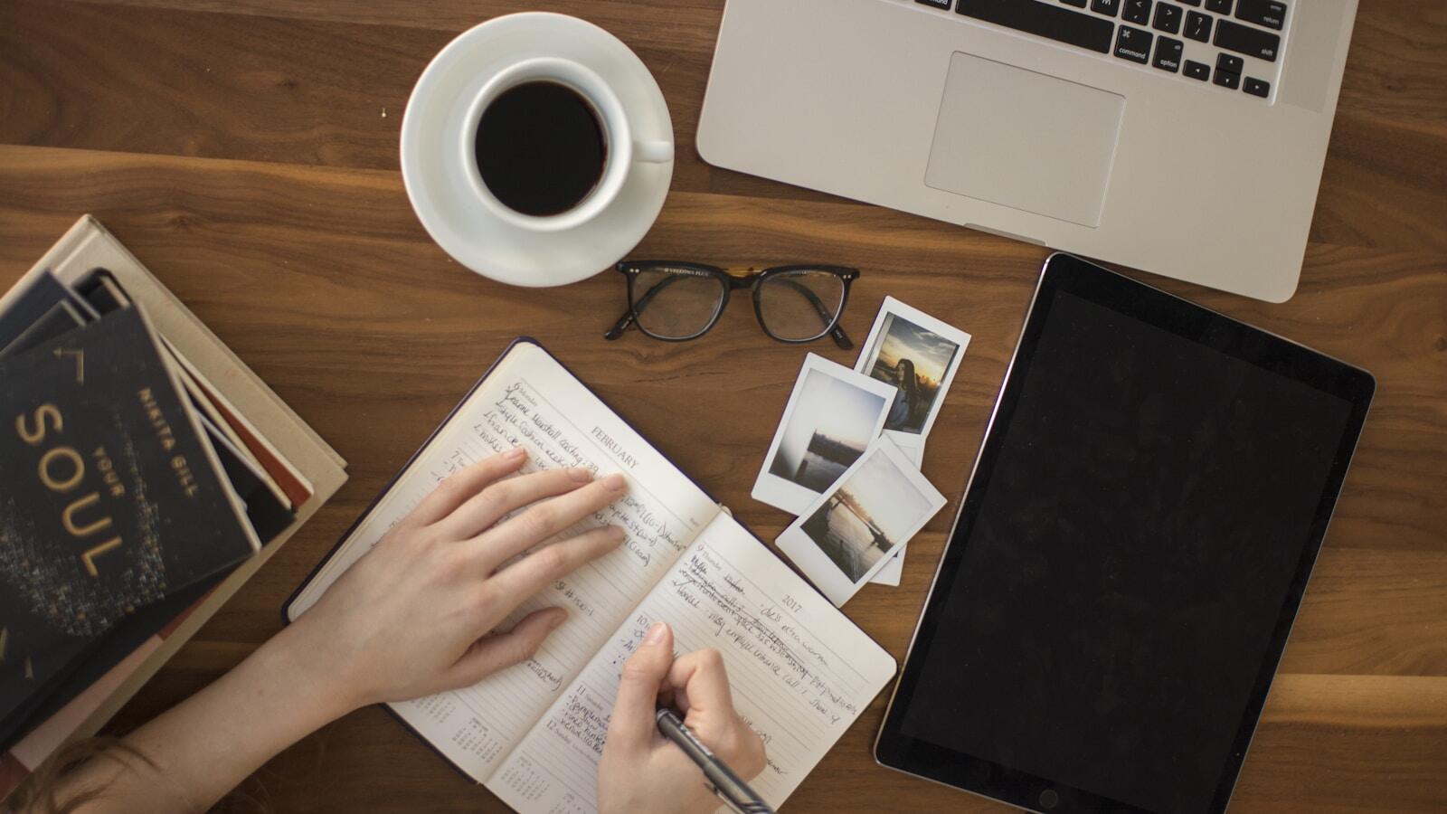 Professional translation workspace with documents and laptop